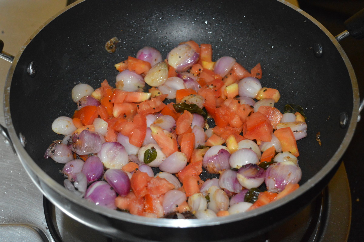 Add chopped tomatoes and some salt. Continue to saute until tomatoes become soft.