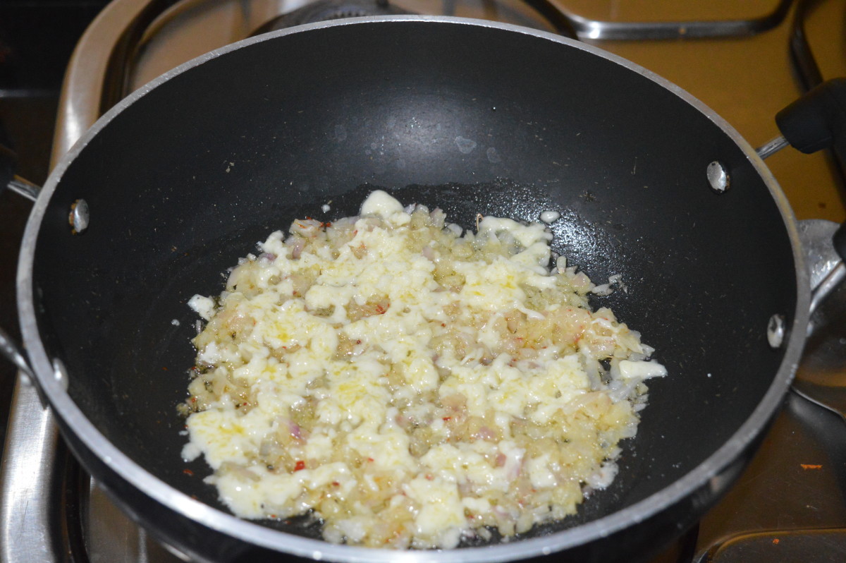 Step four: Uniformly spread half of the grated cheese over the onions. Spread half of the potato mixture on top Now spread the remaining cheese. Finally, spread the remaining potato.