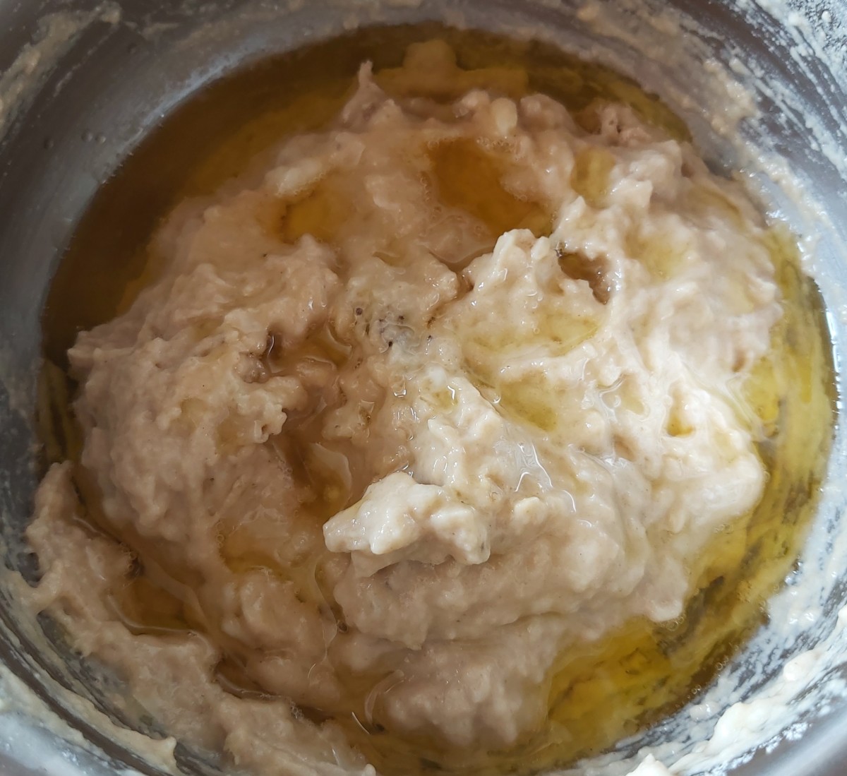 Add the hot ghee to the prepared batter.