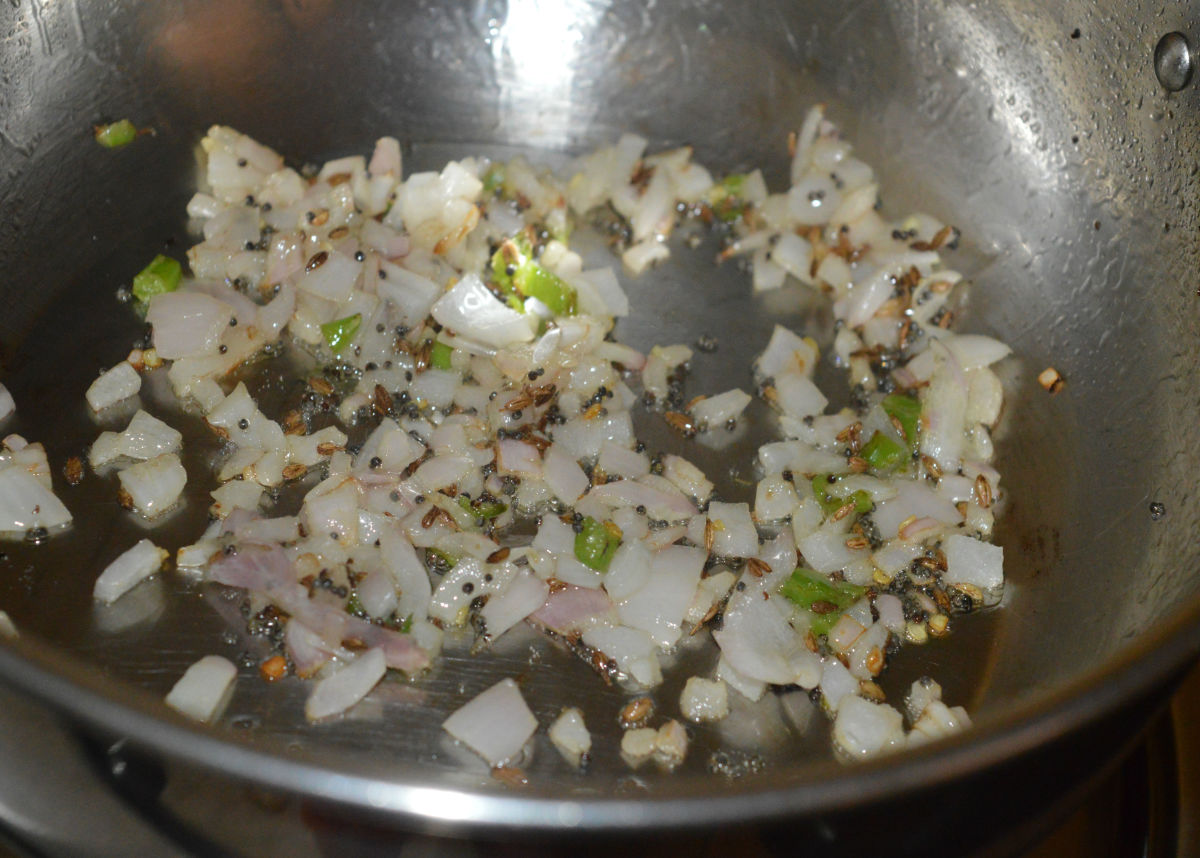 Saute the mixture until the onions become pinkish.