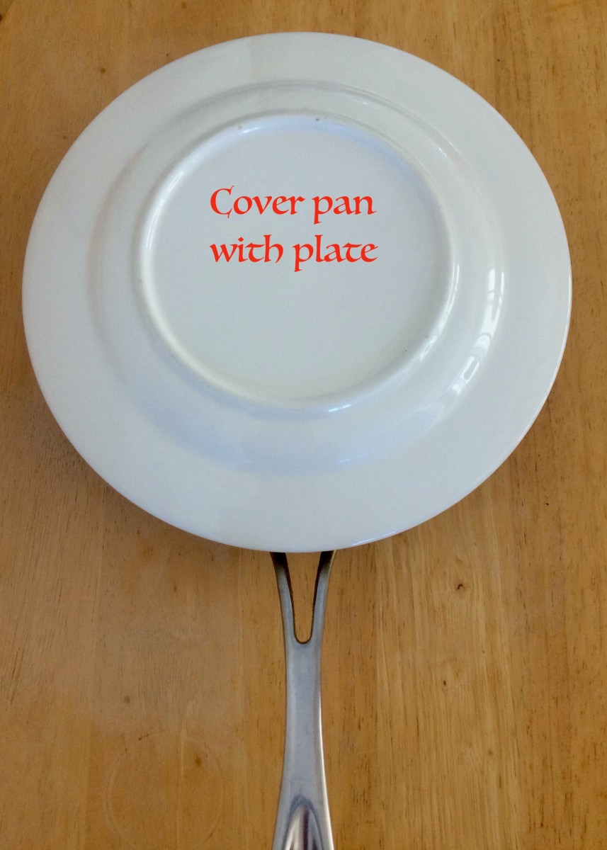 Place a plate over the pan.