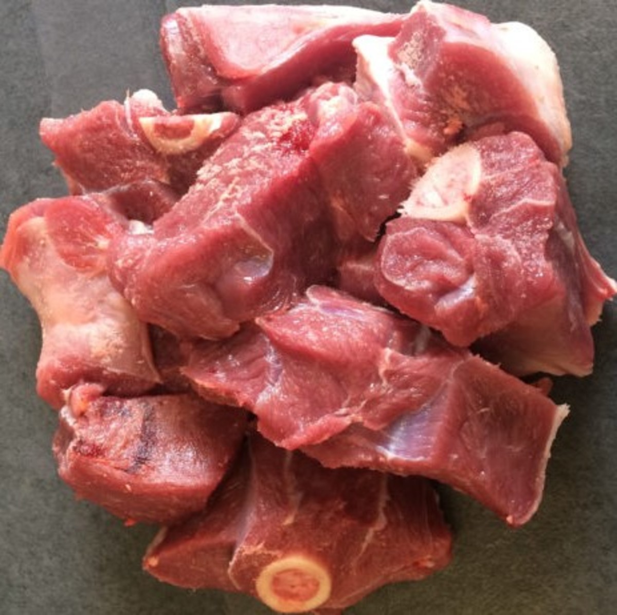 This is what cut-up goat meat looks like. You can also buy the cut-up meat from the store, if available.