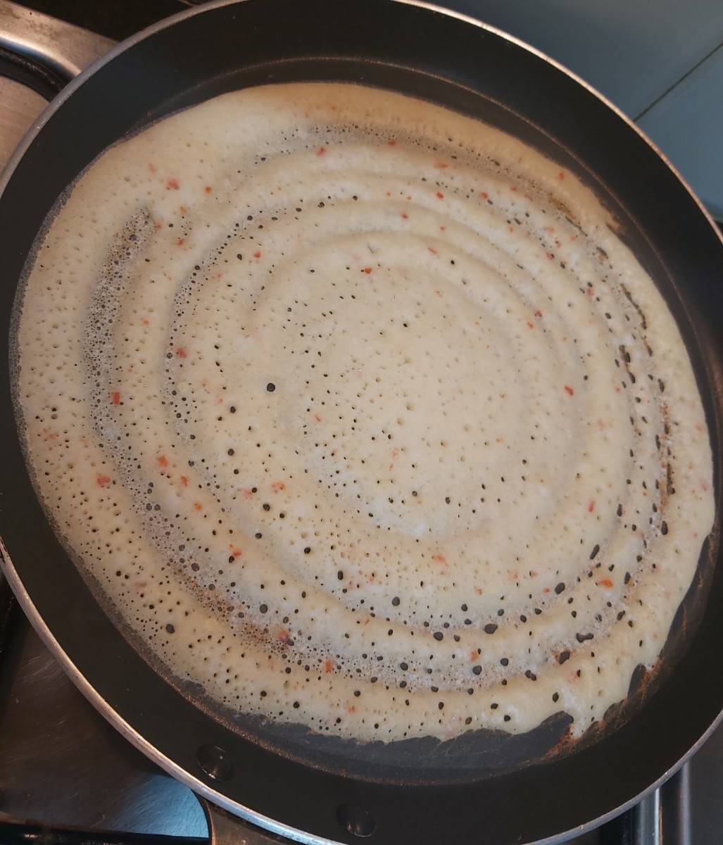 Cover the dosa and cook on medium flame till top of dosa is cooked completely. You can roast it if you want.