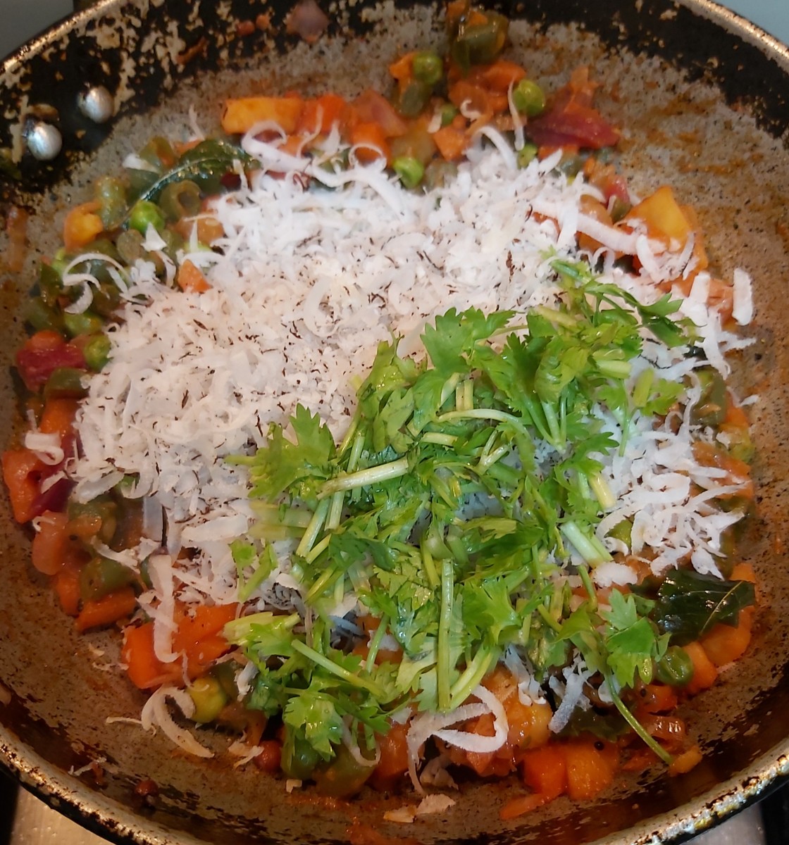 Add grated dry coconut and finely chopped coriander leaves.