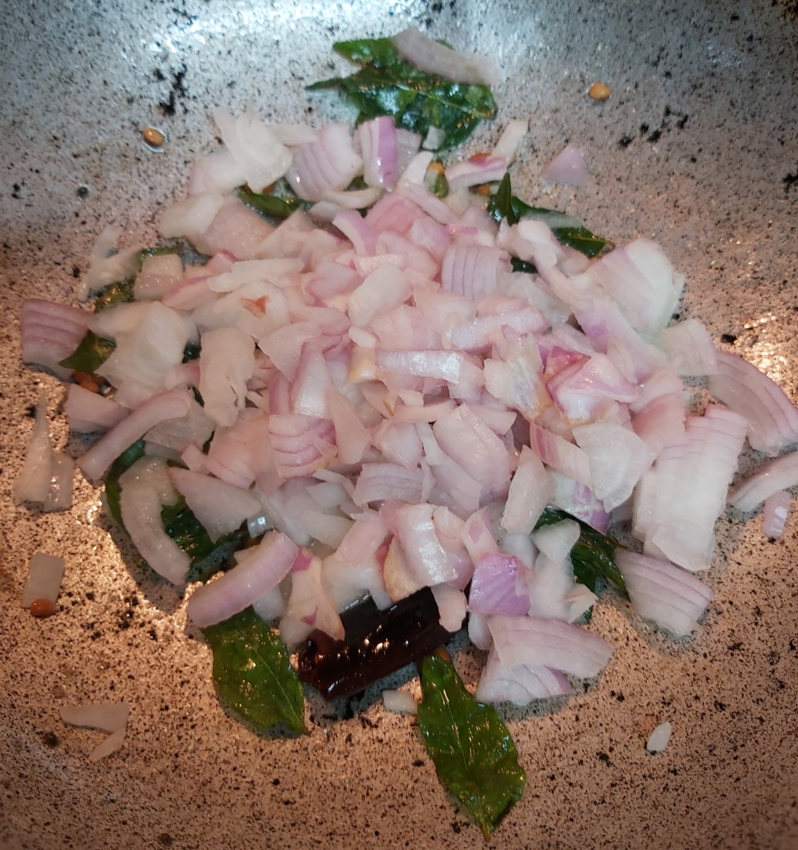 Add finely choppes onions.