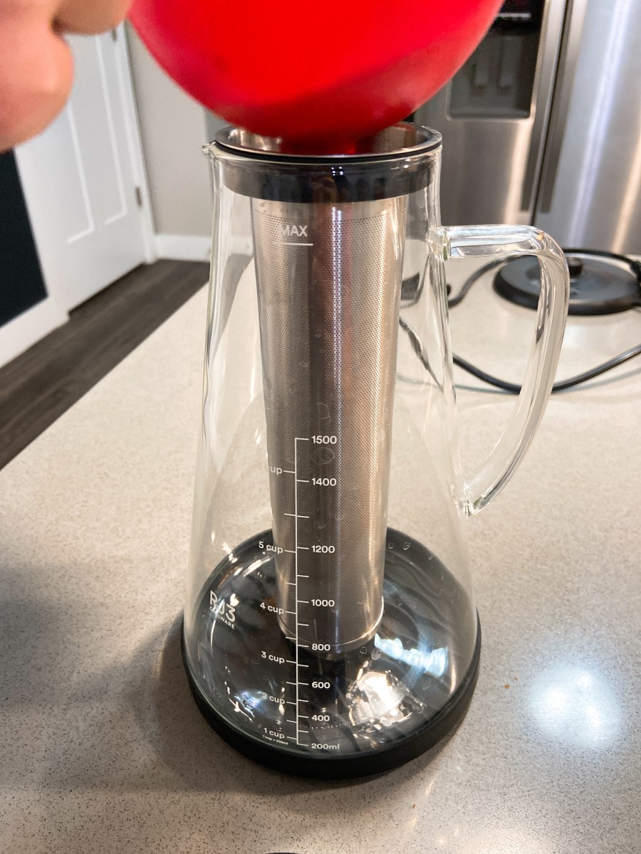 Add 110 grams grounds to the filter, approximately 5/6 of the filter.