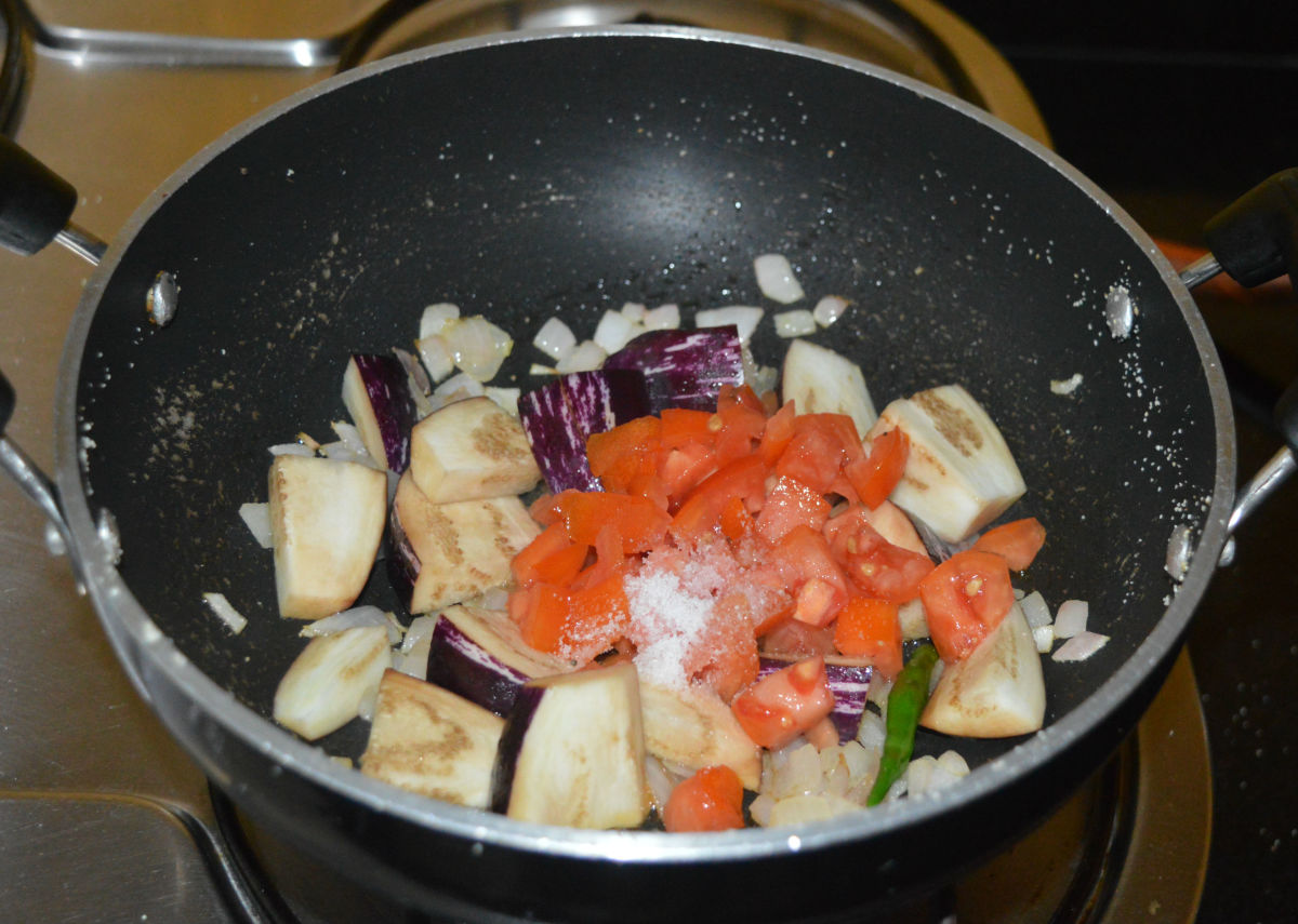 Add chopped tomatoes and turmeric powder.