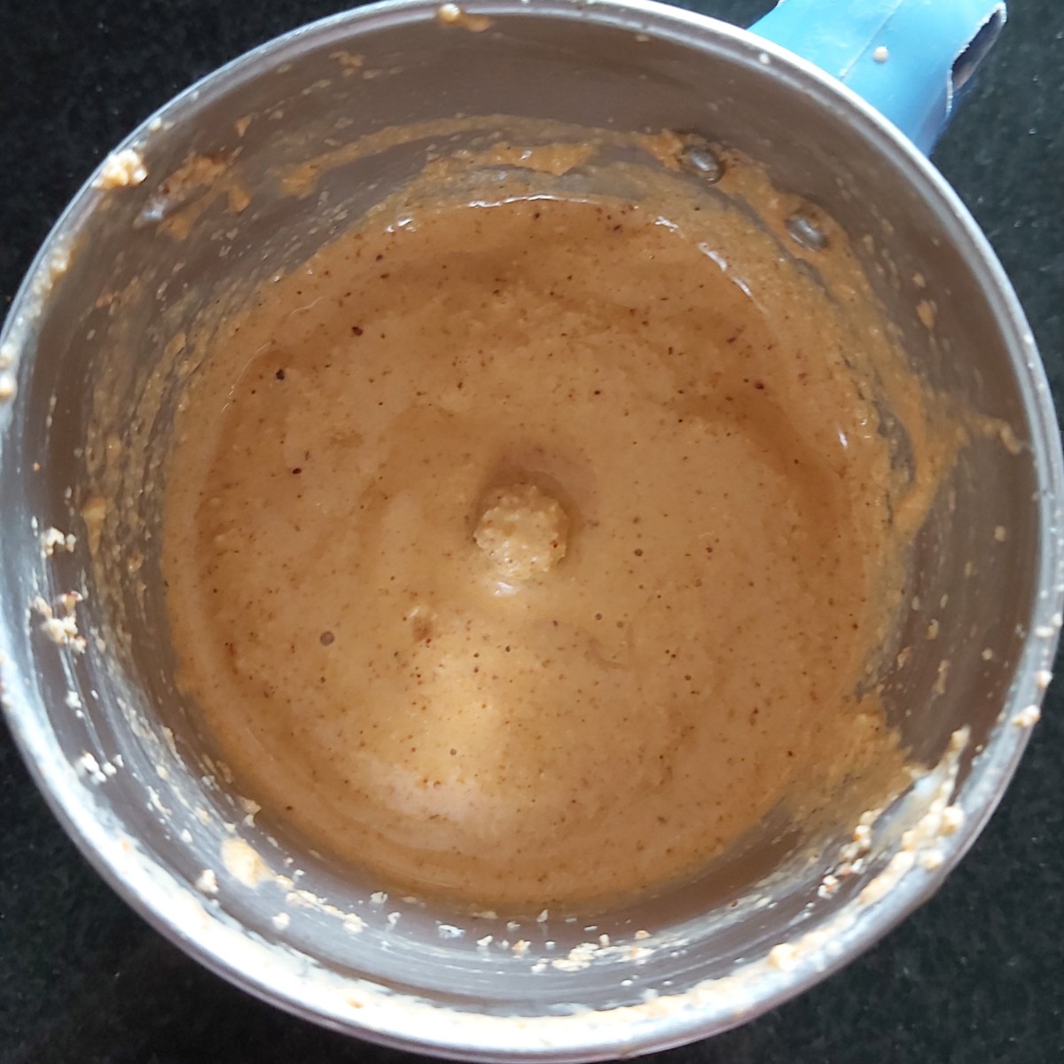 Add 3-4 tablespoons of water (or as required to grind coconut). Grind to a smooth paste.