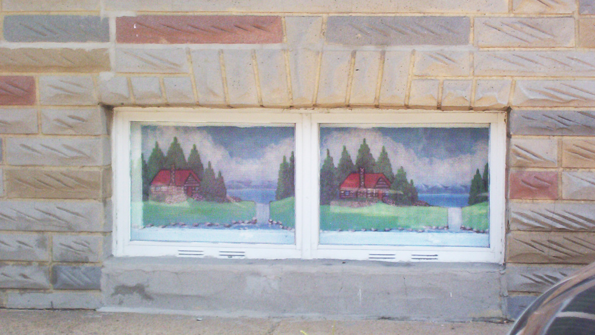 Painted screens in a basement window