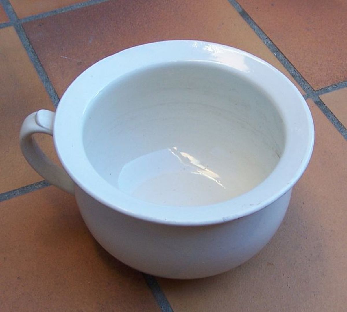Old-fashioned chamber pot for overnight use