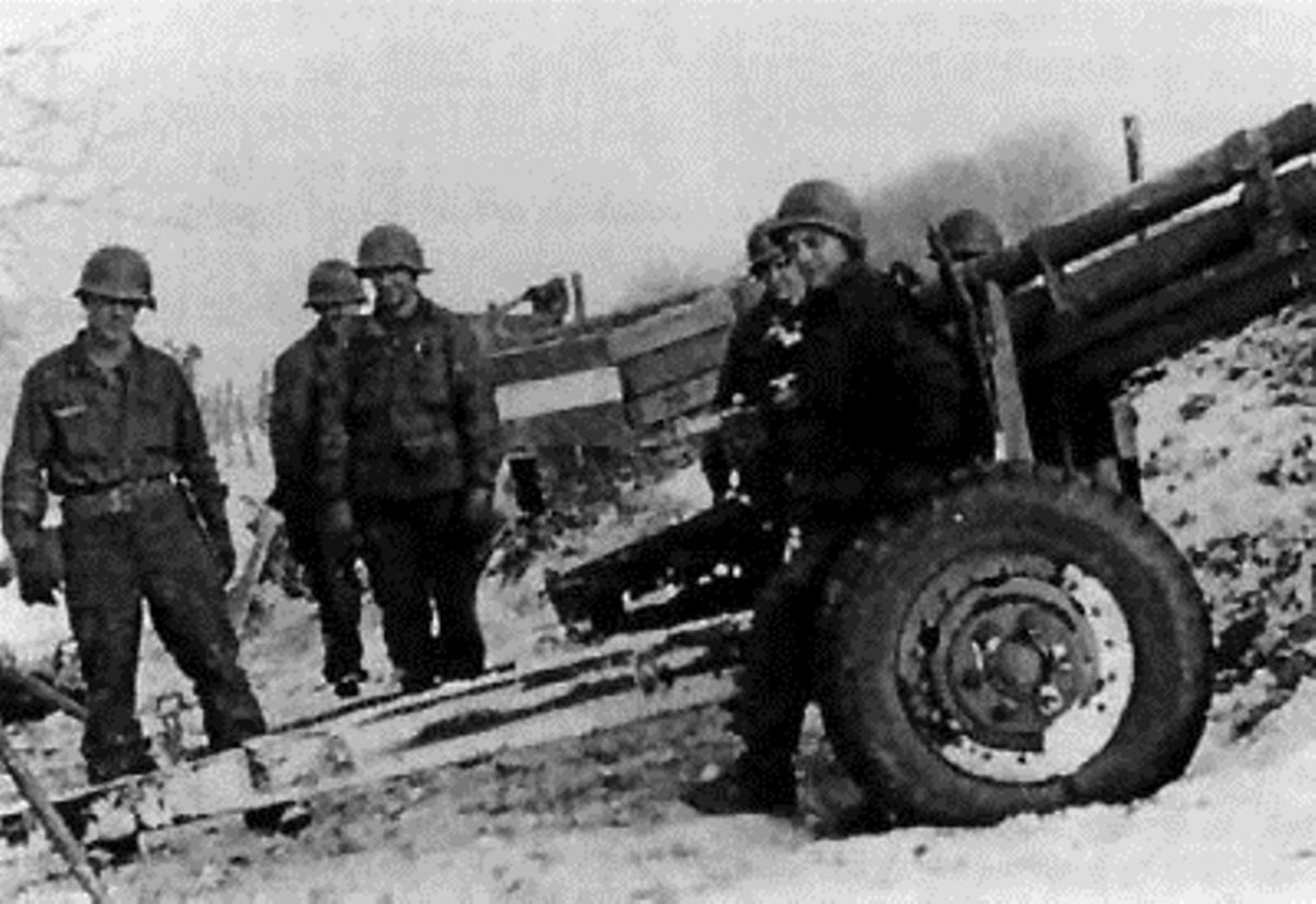A 105mm gun section during the Bulge (591st FAB, 106th ID).