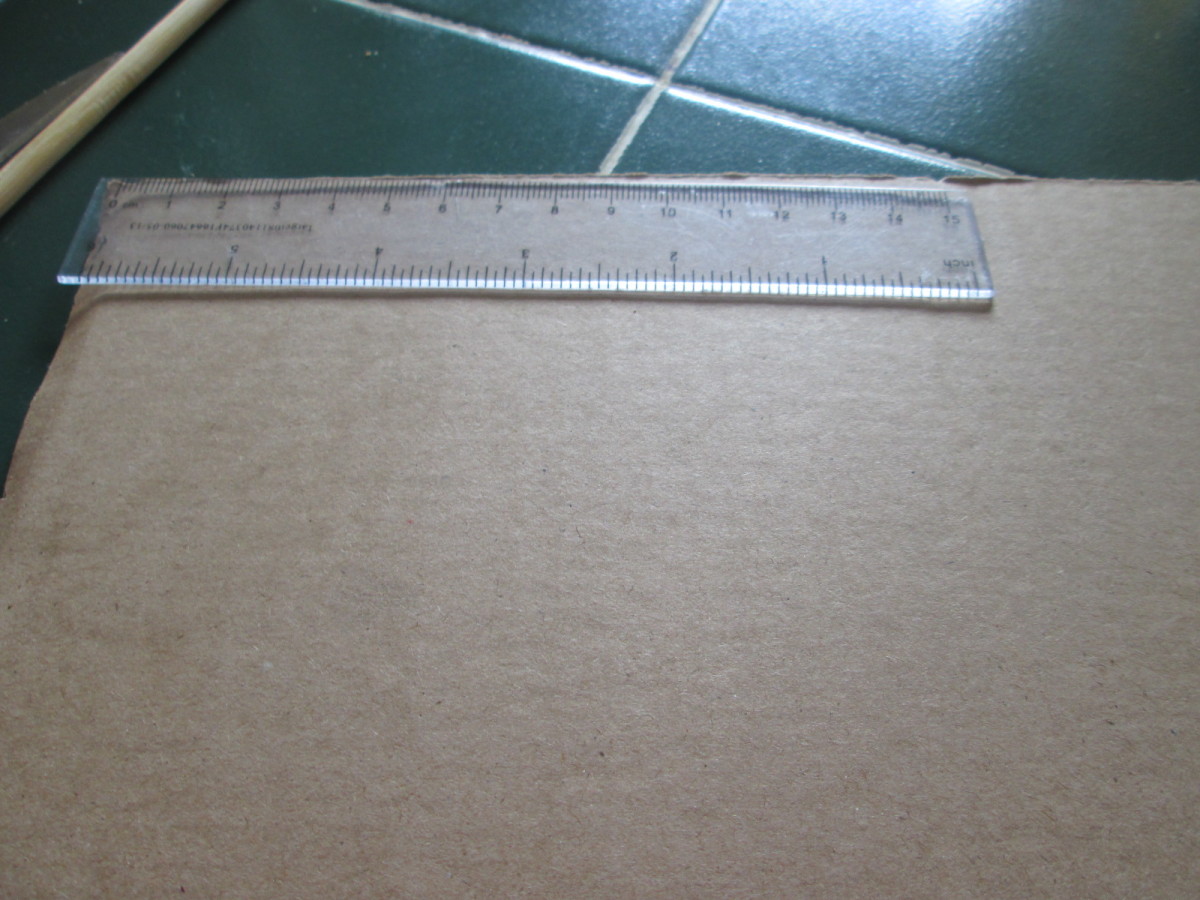 1.Measuring the cardboard.