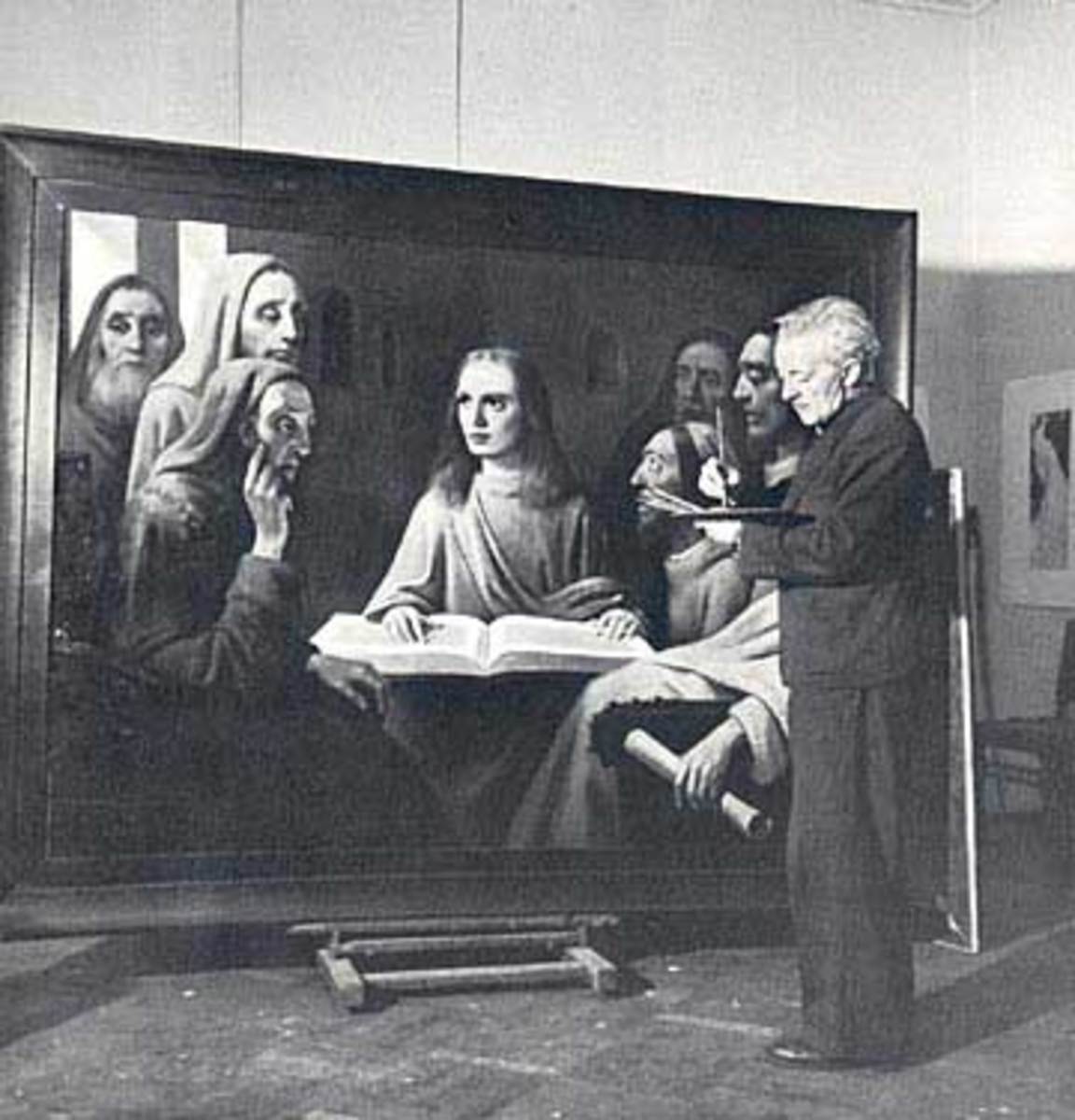 Van Meegeren is demonstrating his forgery skills to a group of art experts.