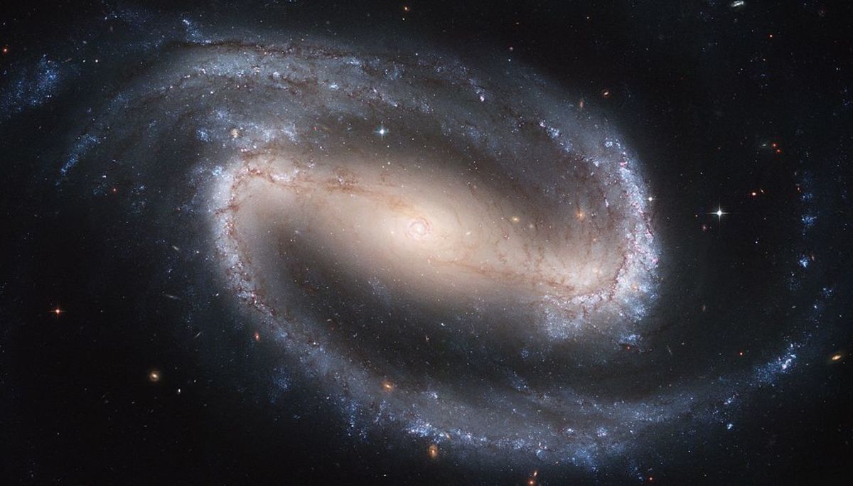 An image of a barred spiral galaxy taken by the Hubble Telescope