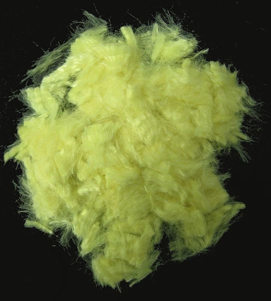 Golden yellow aramid fiber (Kevlar). The diameter of the filaments is about 10 µm. Melting point: none (does not melt). Decomposition temperature: 500-550 °C. Decomposition temperature in air: 427-482 °C (800-900 °F).