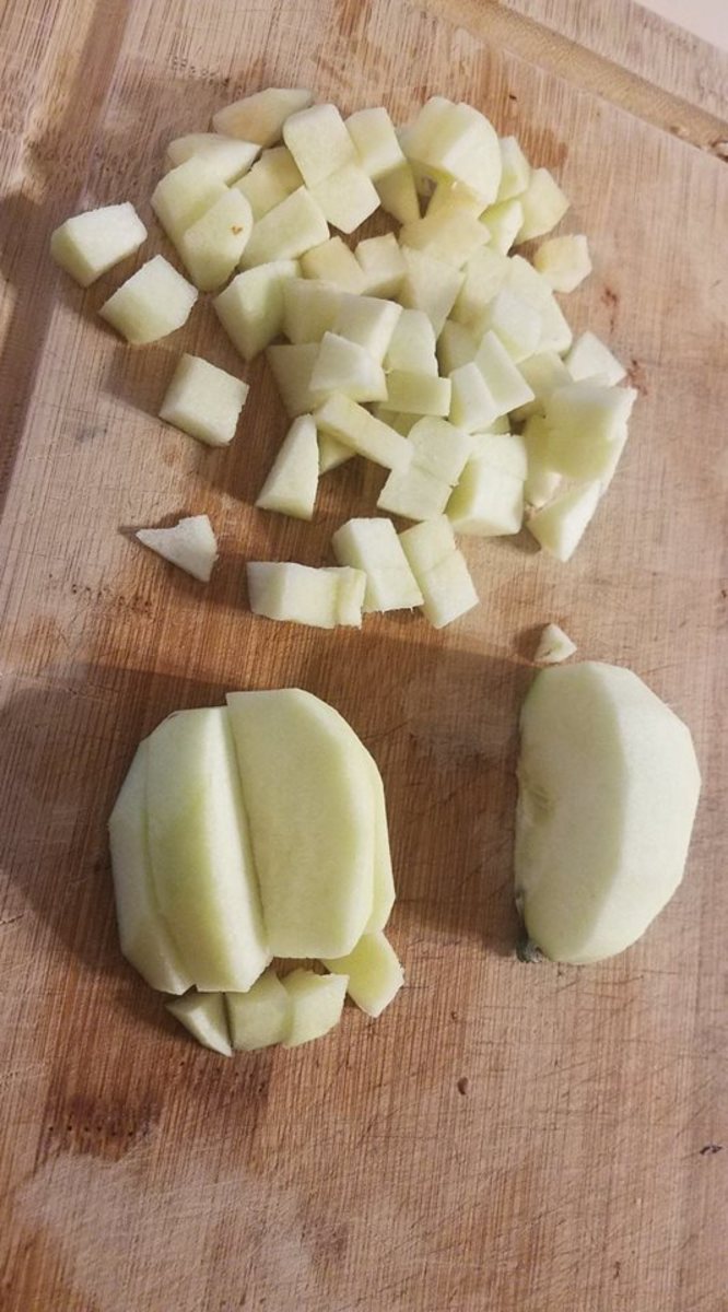 Start by peeling a Granny Smith apple and cutting it into cubes.