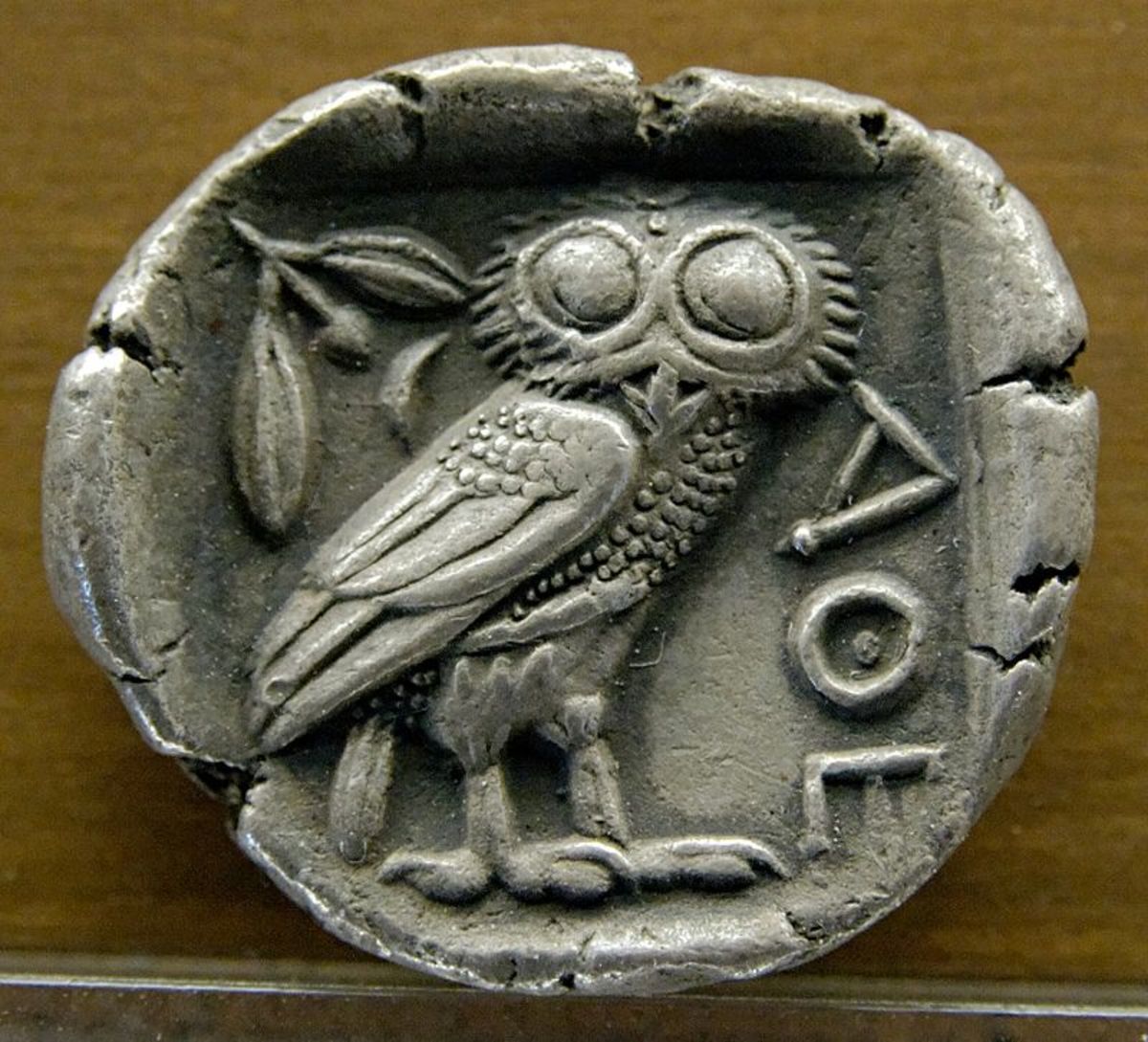 Owl iconography on an ancient artifact.