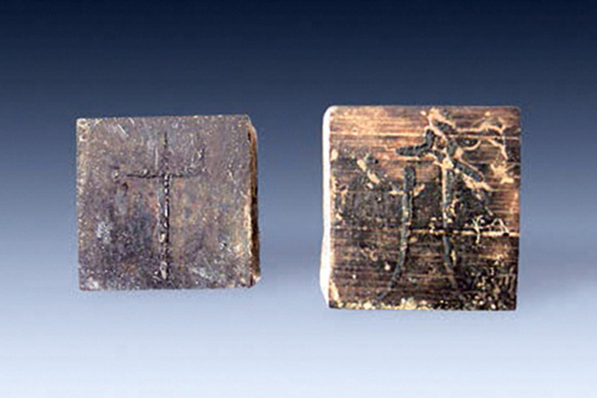 Two of the game pieces found in the tomb.