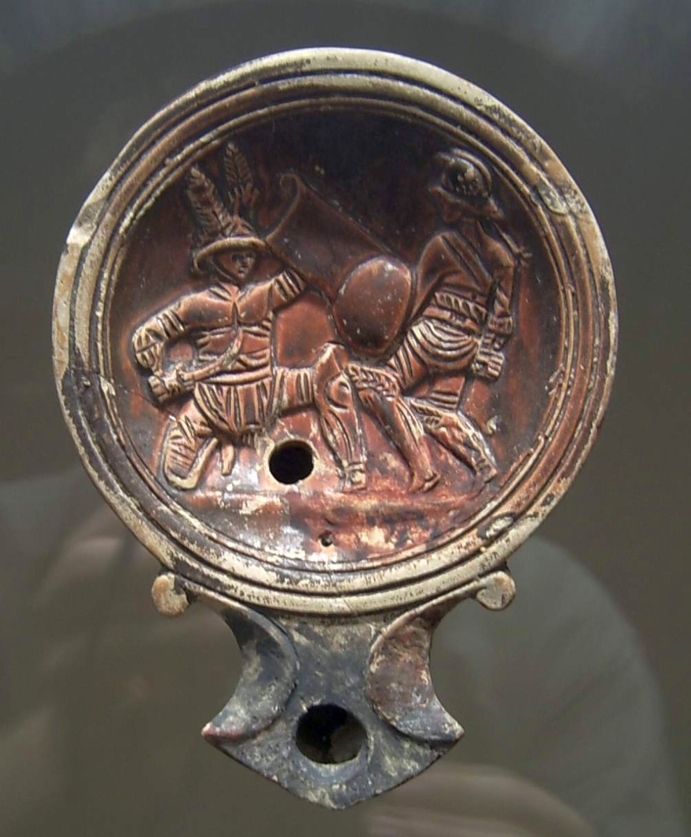 Oil lamp with Gladiators fighting at the Römisch-Germanisches Museum Cologne