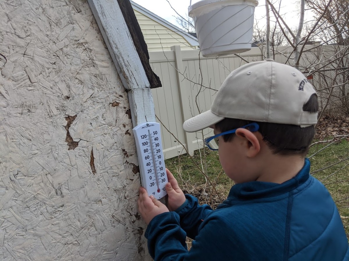 Kids can track the weather by reading the temperature off a simple thermometer.  