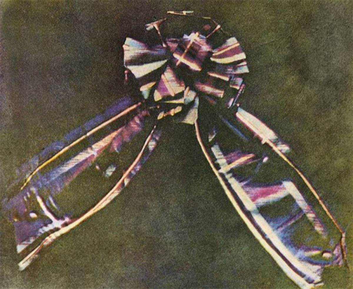 The first color photograph made by the three-color method suggested by Maxwell in 1855, taken in 1861 by Thomas Sutton. The subject is a colored ribbon, typically described as a tartan ribbon.