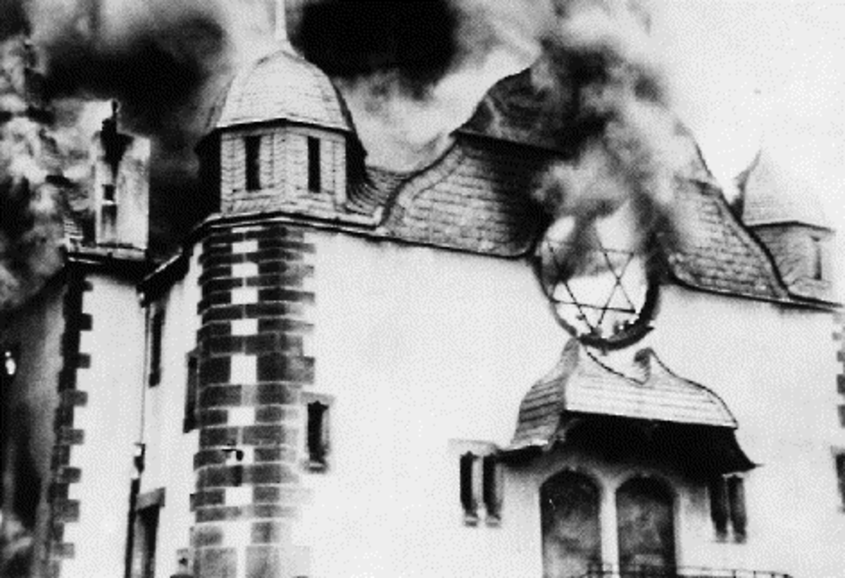 During Kristallnacht, the Night of Broken Glass, a synagogue burns in Siegen, Germany. November 10, 1938. 