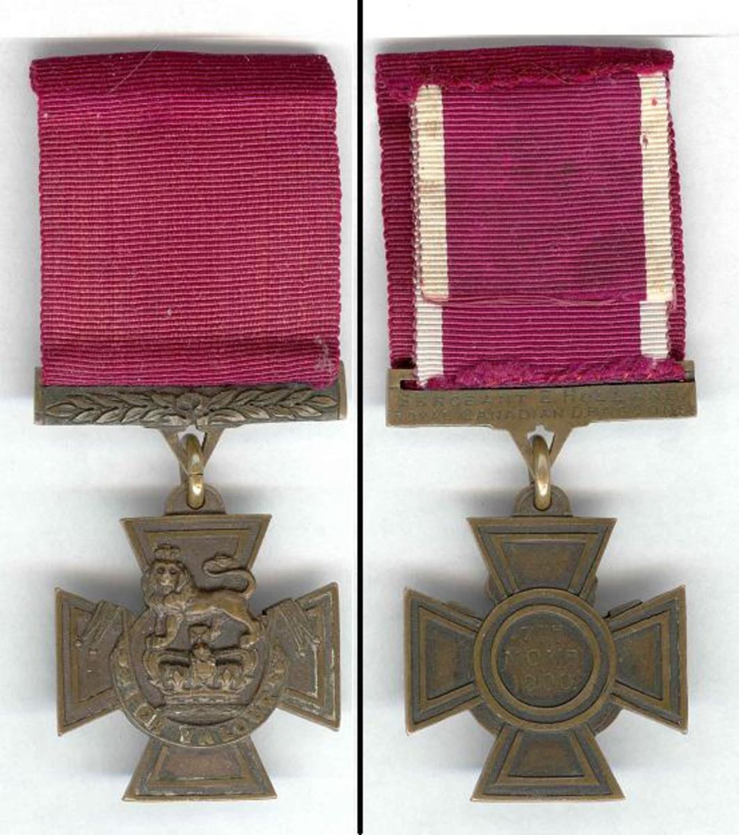 The front and back of a Victoria Cross Medal