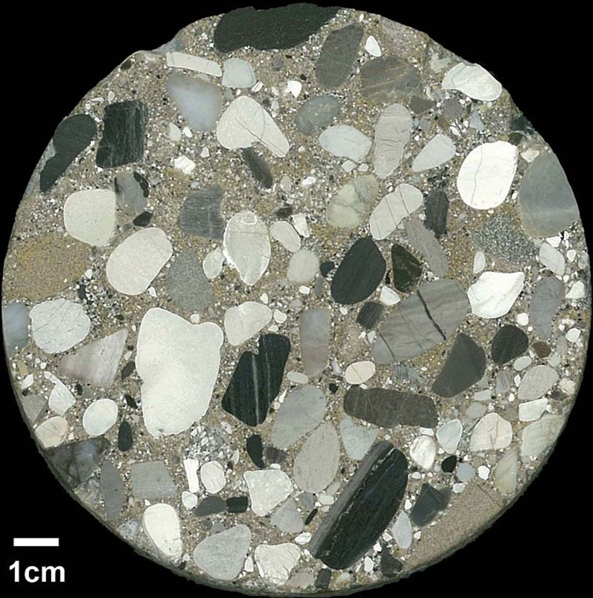 The conglomerate in this core sample has older clasts surrounded by a younger matrix of silt, sand, and clay