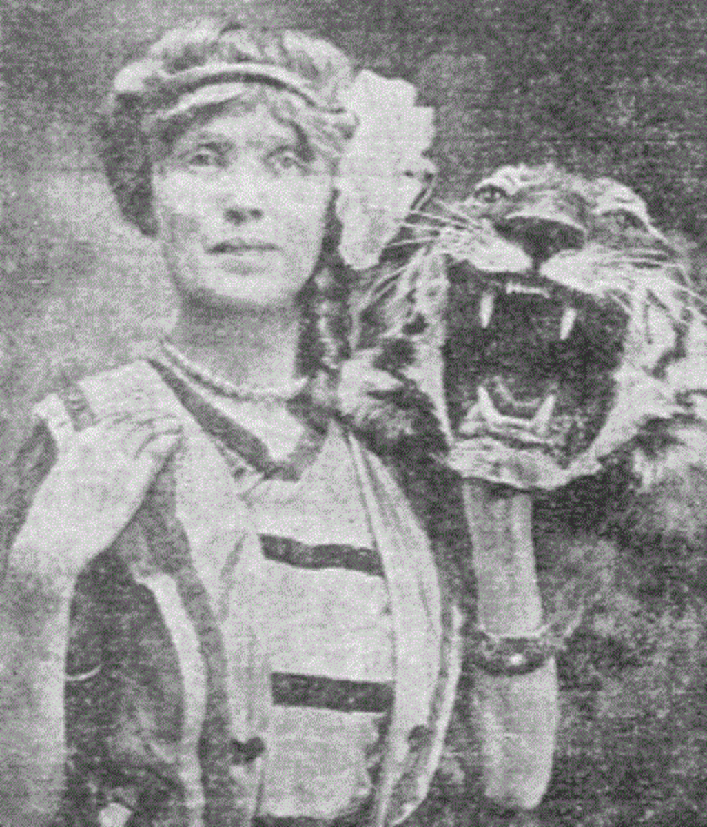 Mabel Stark and one of her favorite tigers. In 1916, she adopted an orphan Bengal tiger cub as her own and named him Rajah. 