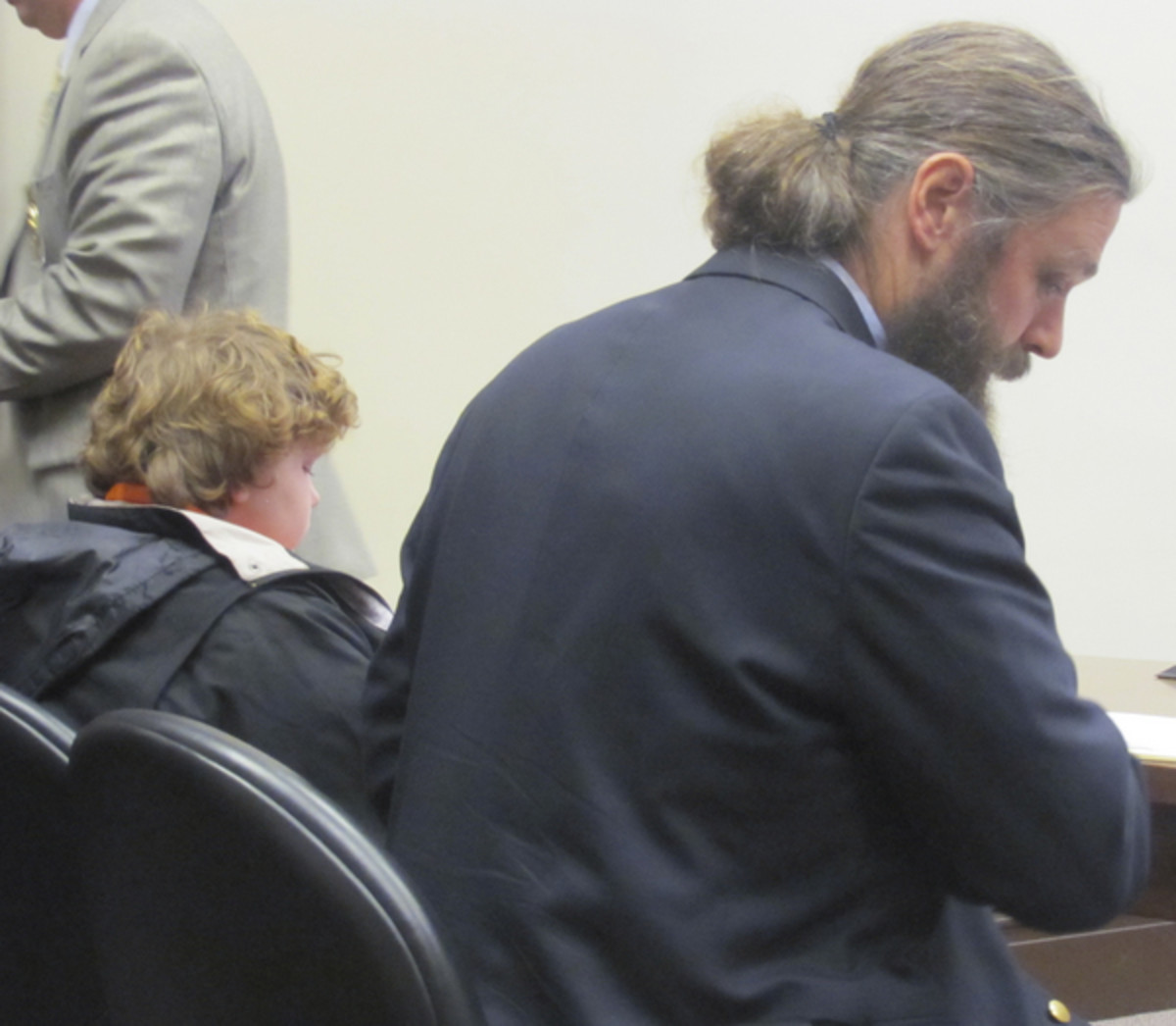 Joseph McVay and his lawyer at a hearing.