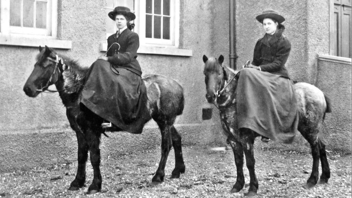 Why did women use side saddles?