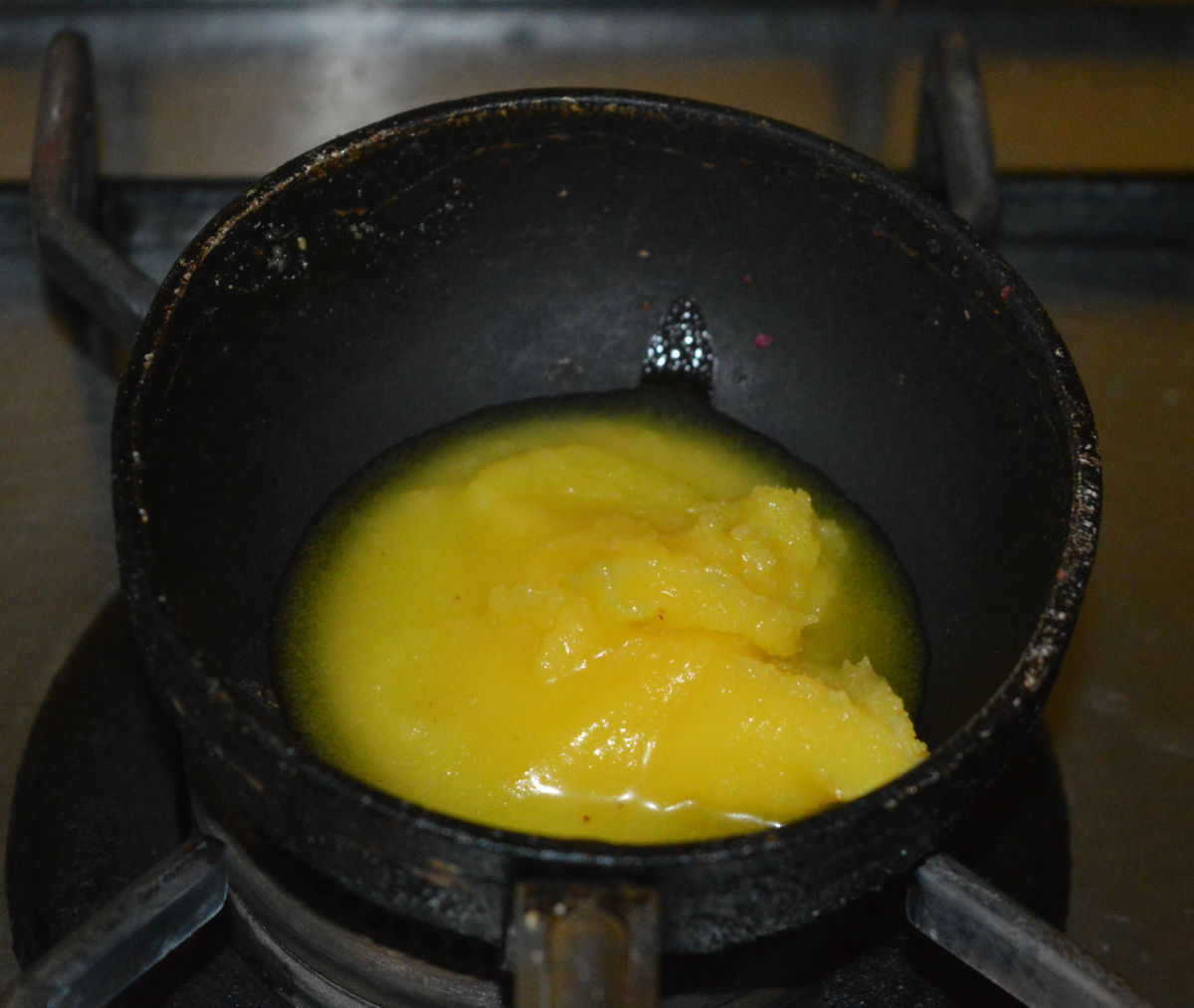 Step one: Melt the ghee and make it very hot. Turn off the heat.
