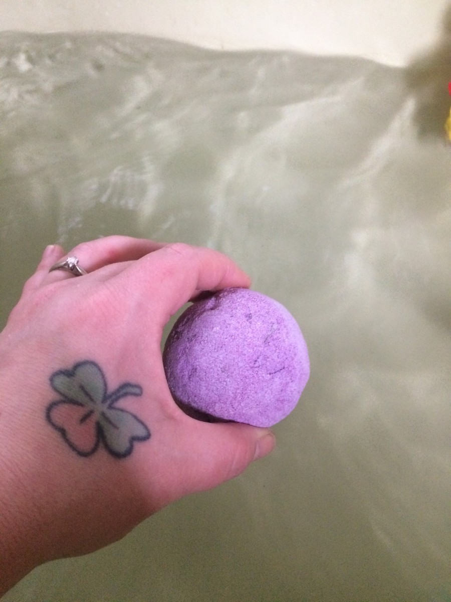 Adding the lavender bomb to the bath.