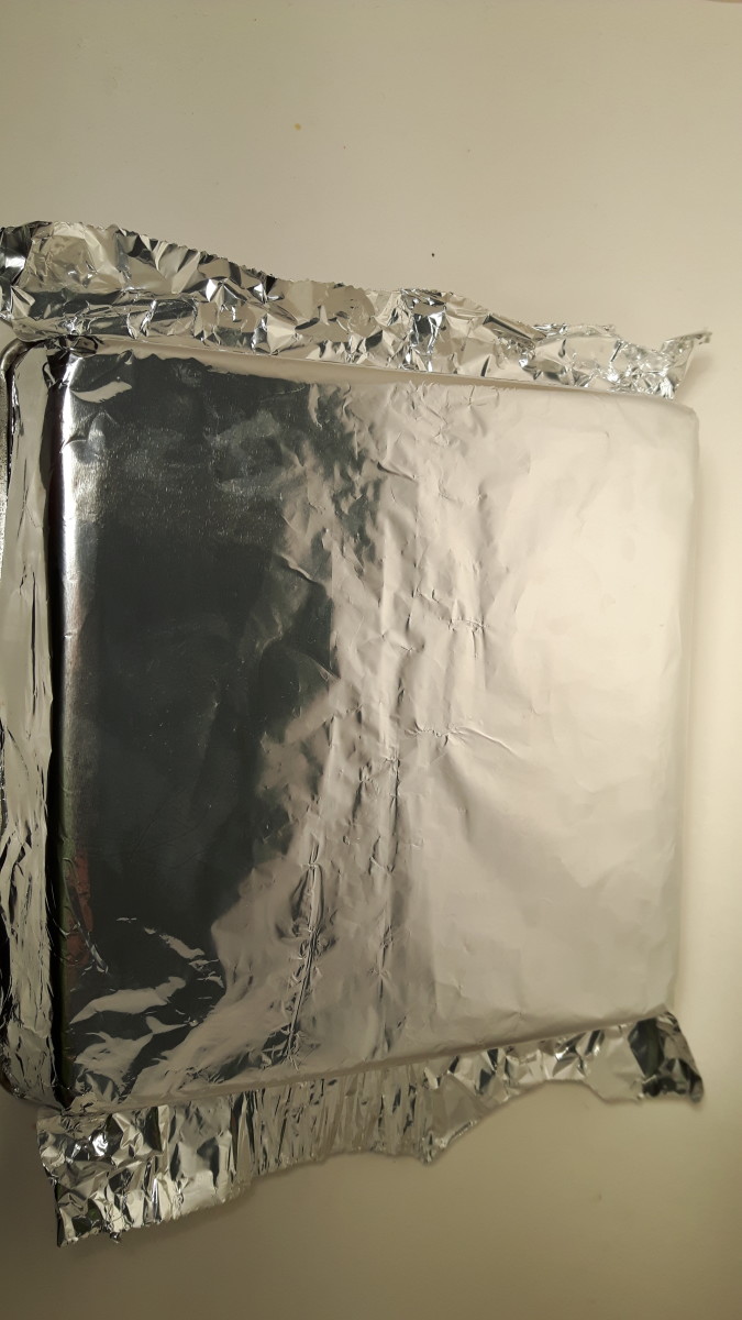 the foil is form-fitted to the outside of the cake pan