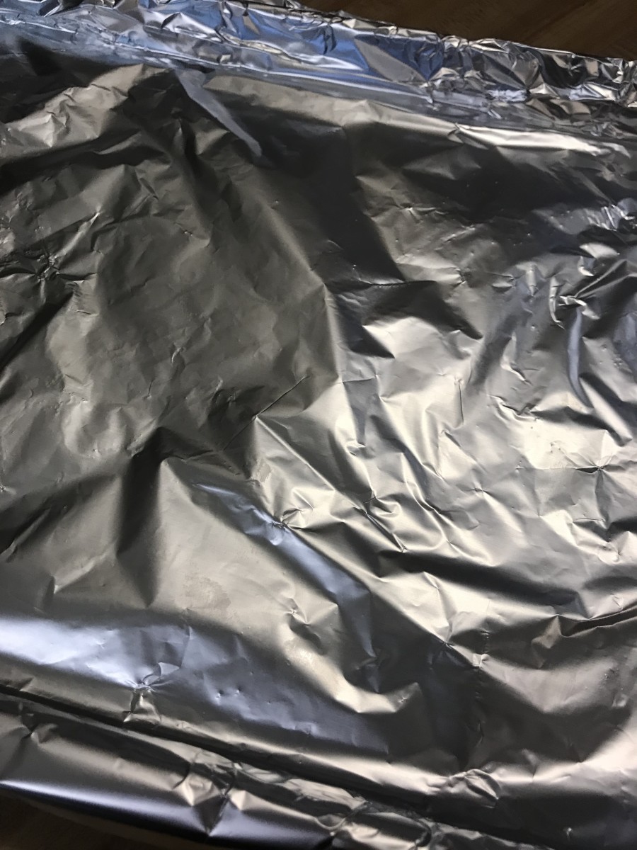 Throw some aluminum foil on a baking sheet. Not only does this eliminate a lot of clean-up, but it helps ensure even cooking during the roasting process.
