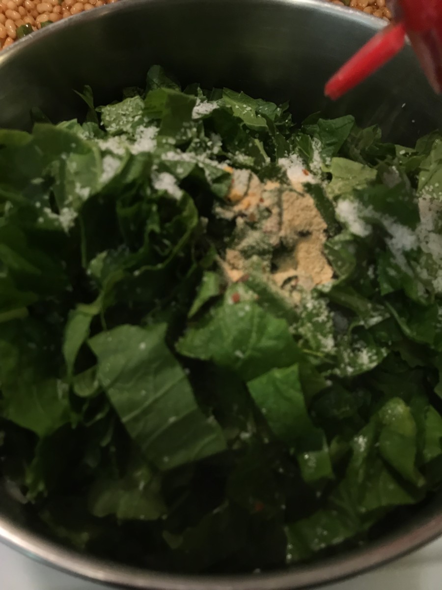 After tossing in and cooking the greens, just a few seasonings are all you need to really make the flavor of this dish pop. Kosher salt, fresh black pepper, garlic powder and red pepper flakes are it, but they are a beautiful combination.