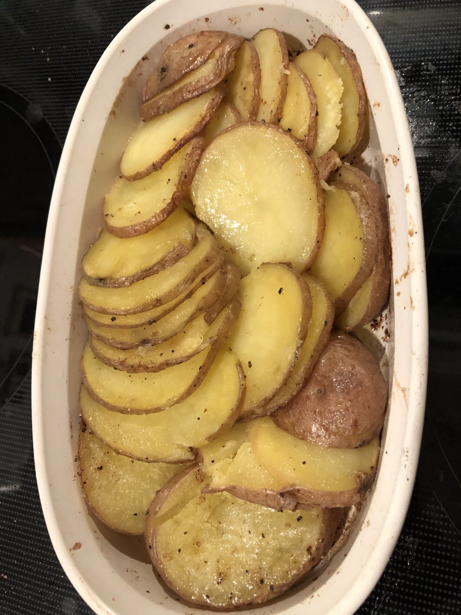 3. Spread potatoes out around the dish 