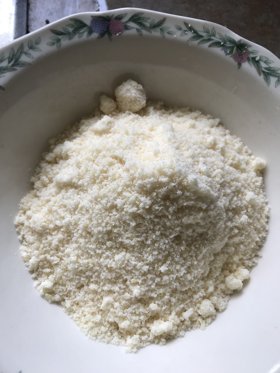 No need to spend a lot of money on expensive Parmesan cheese; this recipe works perfectly well with the inexpensive shelf-stable "shaker cheese" from the round containers.
