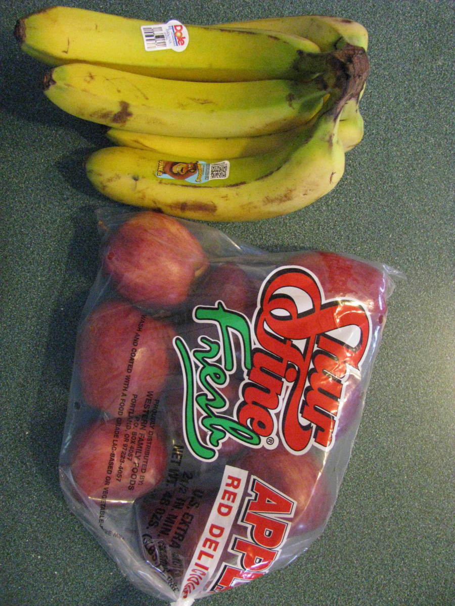 Fresh bananas and apples that came from a supermarket. 
