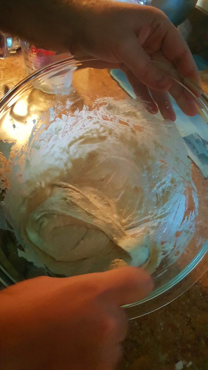 Step five: Turn bowl on side and turn dough with spoon several times to mix well.