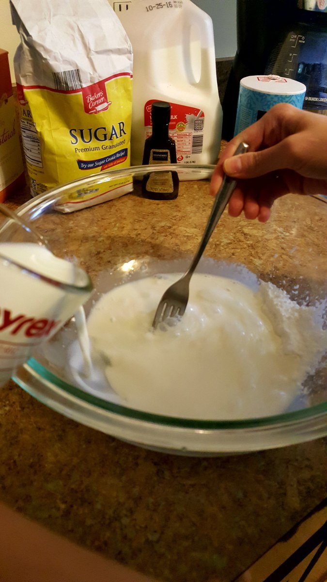 Slowly stir milk into mixture.