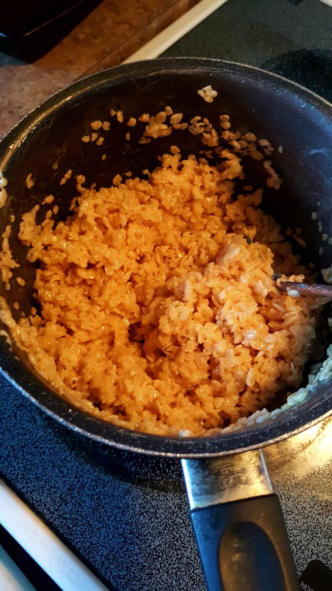 Remove pan from heat. Add crisp rice cereal and stir, mixing well.