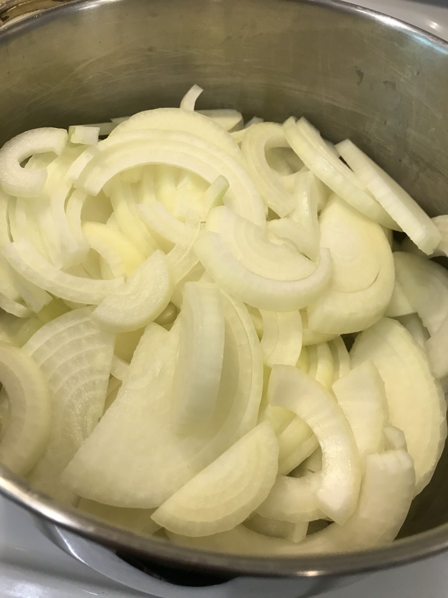 I used three really HUGE onions for this - normally I would use more. That's a two gallon pot, and I'd probably start with 6-7 very large onions. If you're going to spend the time, get the results! I ended up with about 1 1/2 cups of finished product