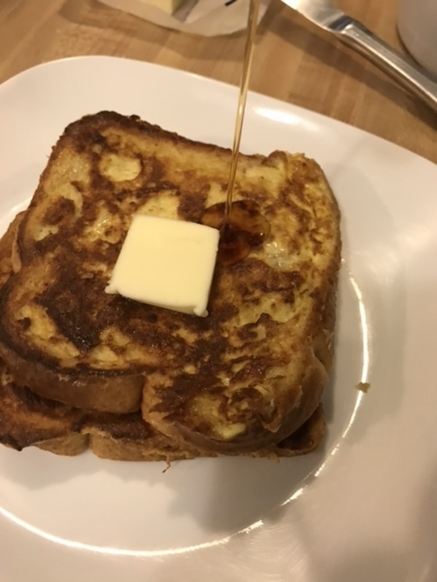 Although my kids will throw French Toast in the toaster to reheat it, it is best served immediately. Top it however you like best. In this case, the kids like simply butter and a little maple syrup.