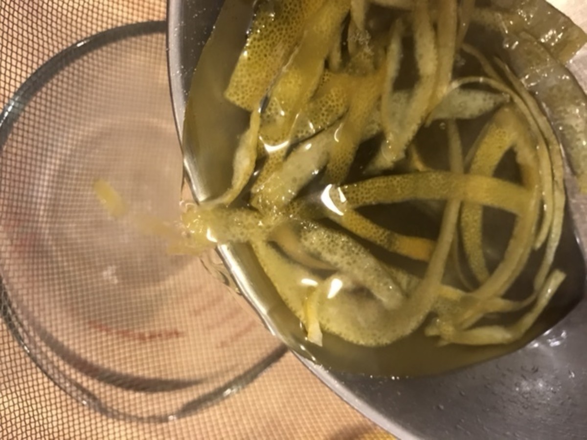 Once translucent, drain the lemon syrup away from the peels. This is best with a fine mesh strainer over a container. That syrup makes the best lemonade, by the way - so hang on to it!