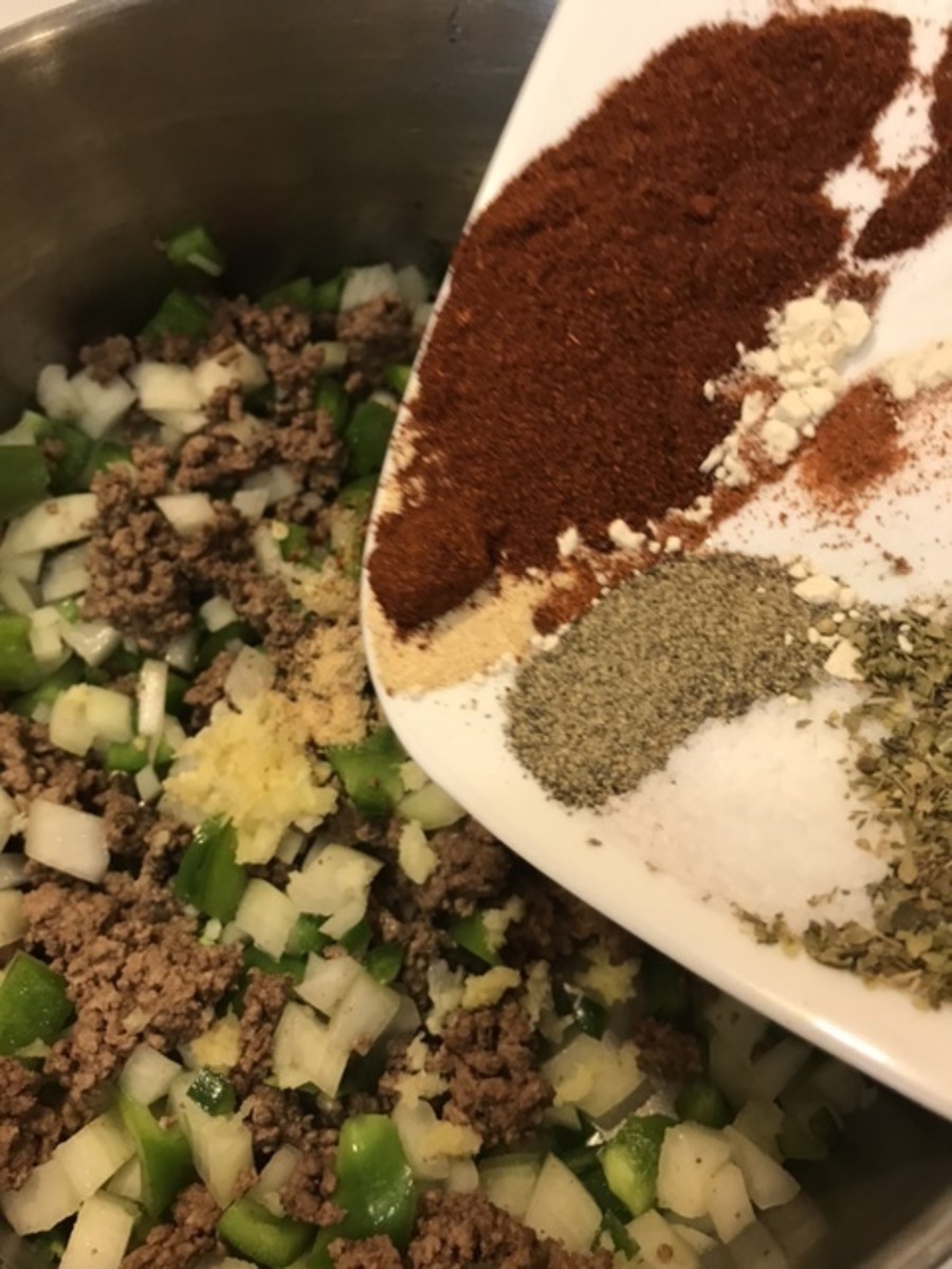 Adding the spices to the beef and veggies before the other ingredients are added helps toast them a little and bring out their flavors.