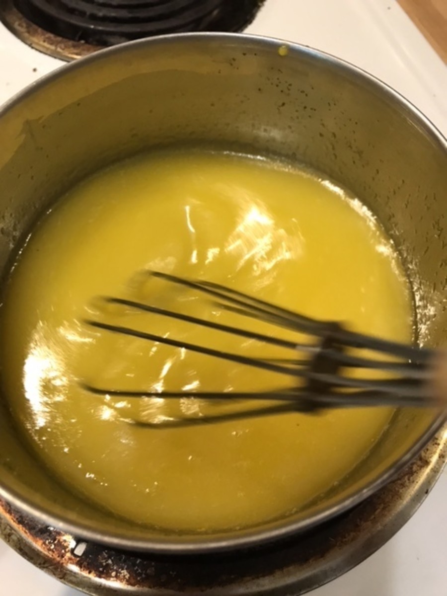 Place the lemon curd on the stove and set the heat to medium low. Whisk constantly and cook for about 10 minutes. Be careful not to let it boil—it may curdle if you do. You simply want it to thicken.