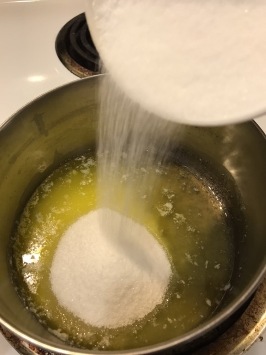 Add 3/4 cups of sugar to the melted butter. 