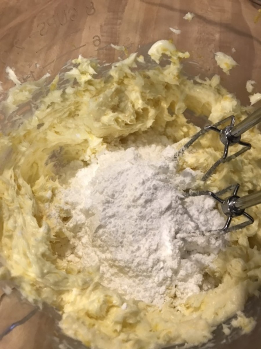 Adding the powdered sugar in about one cup batches, and alternately it with the lemon juice, makes the process much easier. As an aside, it also makes it less messy! Scrape down the bowl as you work.