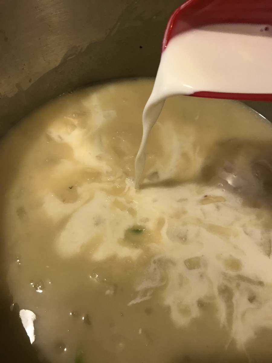 Once the chicken broth is smooth, add the half and half slowly. Watch your temperature after this - the soup will curdle if it gets too hot. Keep the soup barely simmering and you'll be fine.